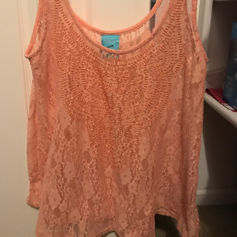 Sheer lace top with beaded detail along neckline